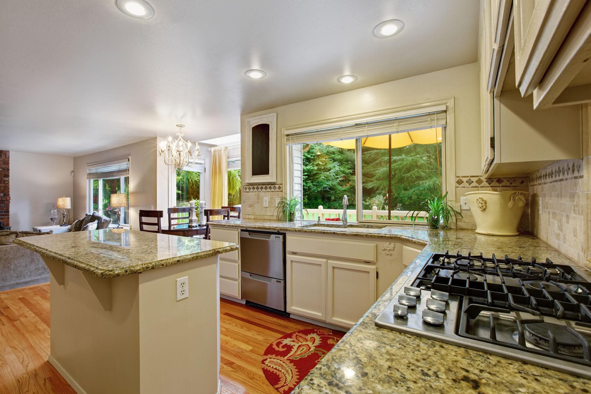 Kitchen island with built-in storage drawers and cabinets